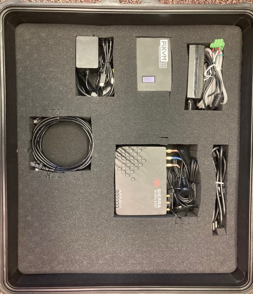 A box with wires and electronic devices

Description automatically generated with medium confidence